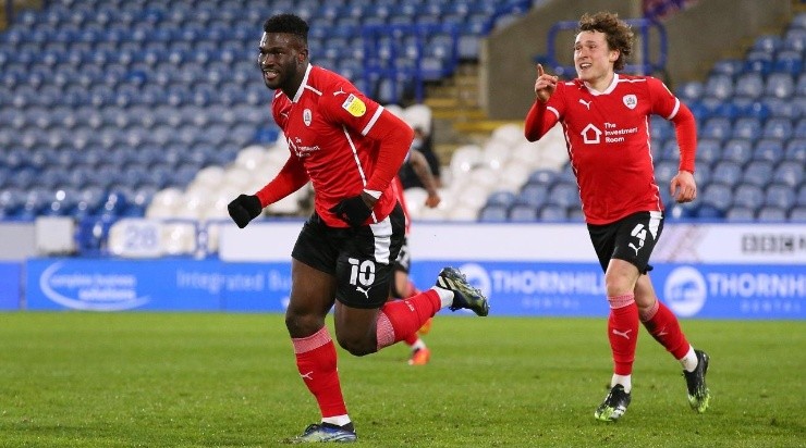 Daryl Dike of Barnsley celebrates after scoring the opening goal during the Sky Bet Championship match between Huddersfield Town (Getty)