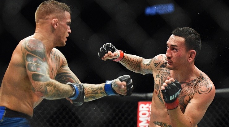 Max Holloway punches Dustin Poirier (Getty).