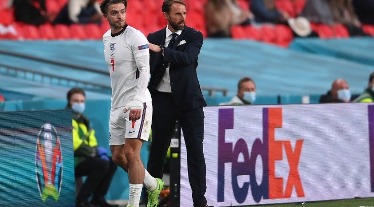 Jack Grealish of England (left) interacts with Gareth Southgate (right). (Getty)