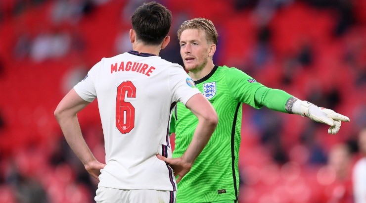 Jordan Pickford (right) of England interacts with Harry Maguire (left). (Getty)