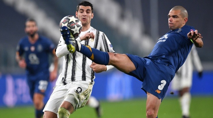 Pepe of Porto (right) attempts to clear the ball whilst under pressure from Alvaro Morata of Juventus (left). (Getty)