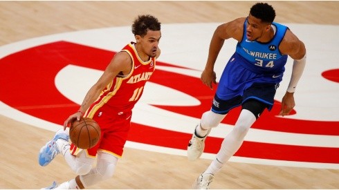 Giannis Antetokounmpo guarding Trae Young. (Getty)