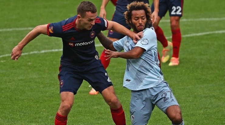 Boris Sekulic #2 of Chicago Fire FC battles with Gianluca Busio #27 of Sporting Kansas City (Getty)