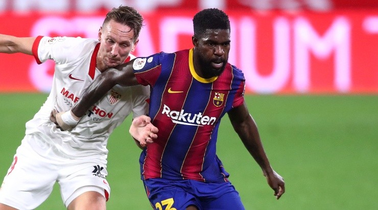 Samuel Umtiti protecting the ball against Luuk de Jong in one of his few appearances in the 2020/21 season. (Getty)