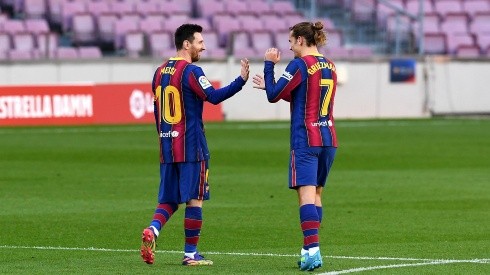 Lionel Messi y Antoine Griezmann durante un encuentro con Barcelona.