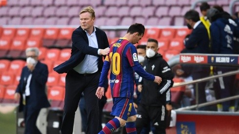 Ronald Koeman y Lionel Messi durante un encuentro.