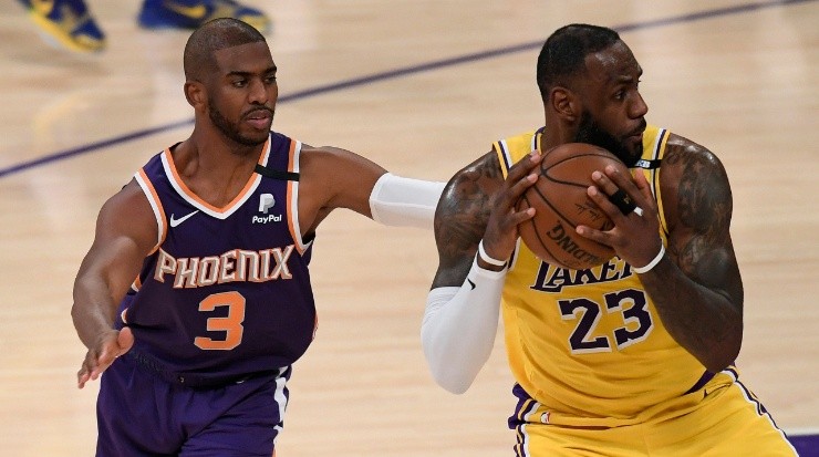 Chris Paul and LeBron James in action during the 2021 NBA playoffs. Will they play together next season? (Getty)