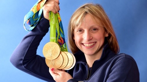 Katie Ledecky of the United States poses for a photo with her five medals. (Getty)