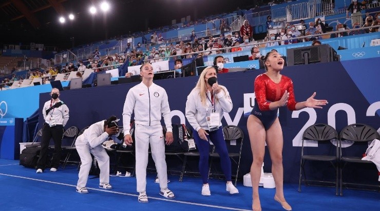 Sunisa Lee, Simone Biles, coach Cecile Landi, and Jordan Chiles of Team United States react during the Women&#039;s Team Final on day four of the Tokyo 2020 Olympic Games (Getty)