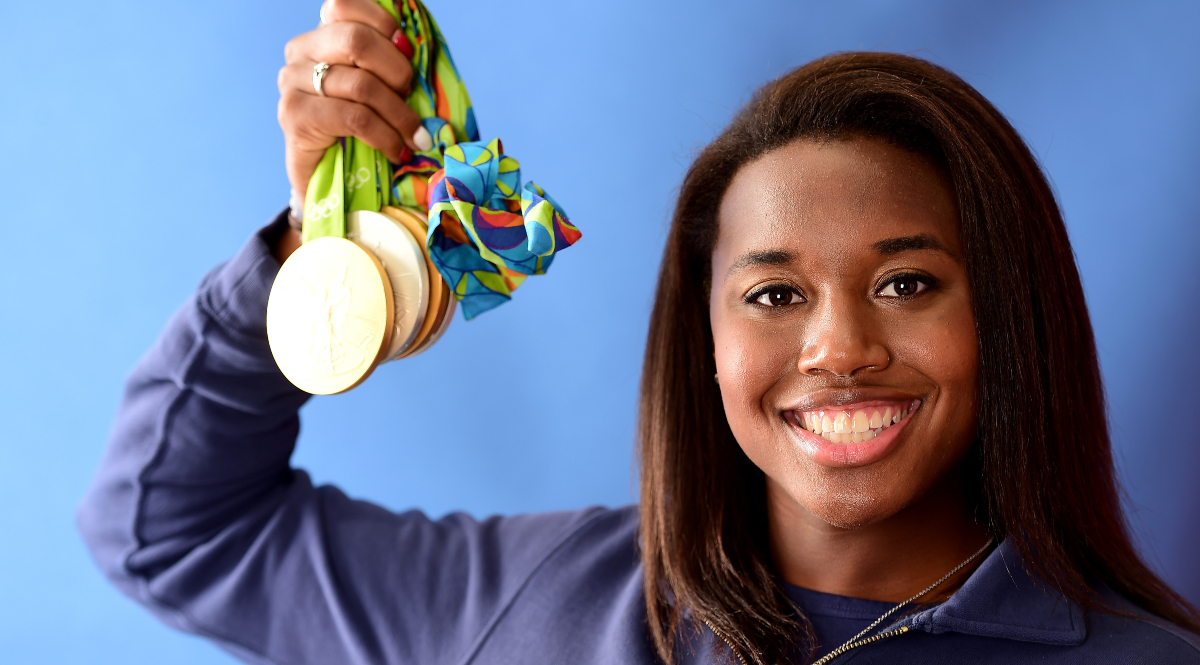 Simone Manuel of the United States poses for a photo with her four medals of Rio 2016. (Getty)