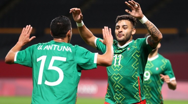 Alexis Vega (right) of Mexico celebrates with Uriel Antuna (left). (Getty)