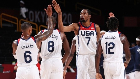 Kevin Durant of United States high-fives teammates. (Getty)