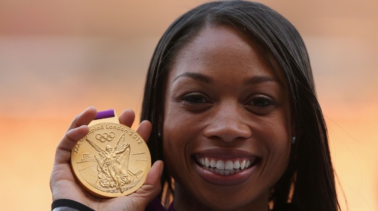 Allyson Felix with the gold medal for the Women&#039;s 200m at London 2012 Olympics. (Getty)