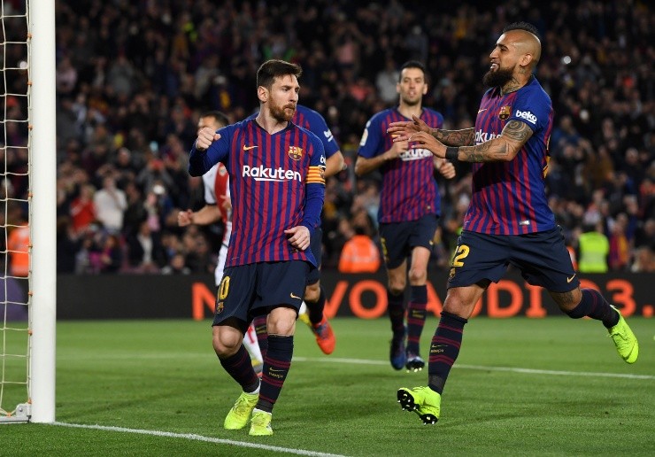 Lionel Messi y Arturo Vidal Lionel Messi y Arturo Vidal