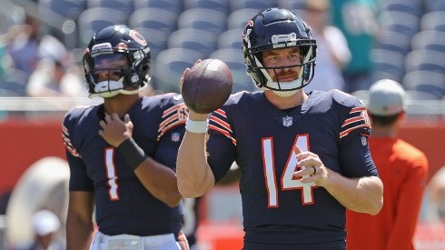 Chicago Bears #14 Andy Dalton and #1 Justin Fields will battle for the starting QB role. (Getty)