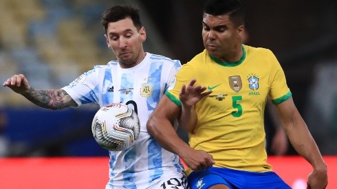 Argentina's Lionel Messi and Brazil's Casemiro fight for the ball (Getty).