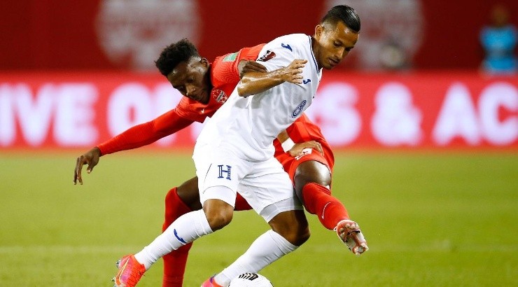 Alphonso Davies #19 of Canada battles for the ball with Edwin Rodriguez #8 of Honduras during a 2022 World Cup Qualifying match at BMO Field on September 2, 2021 in Toronto, Ontario, Canada. (Getty)