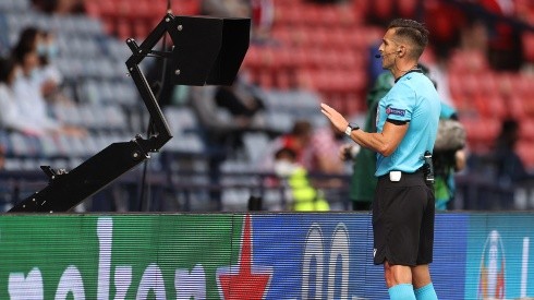 The match referee checks the VAR screen at Euro 2020. (Getty)