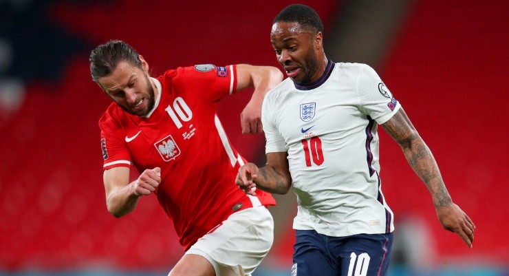 Grzegorz Krychowiak of Poland (left) and Raheem Sterling of England (right). (Getty)