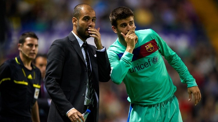 Pep Guardiola y Gerard Piqué en Barcelona en 2011.