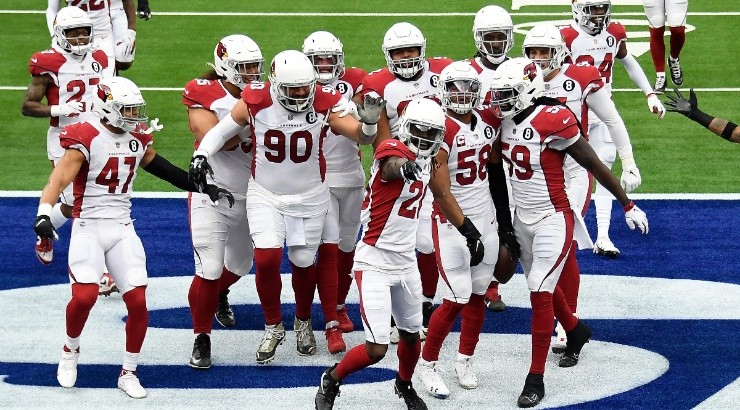 Arizona Cardinals players celebrate after a win. (Getty)