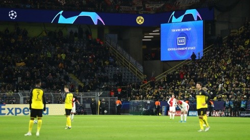 Players waiting for a VAR review during the 2019-20 UEFA Champions League. (Getty)