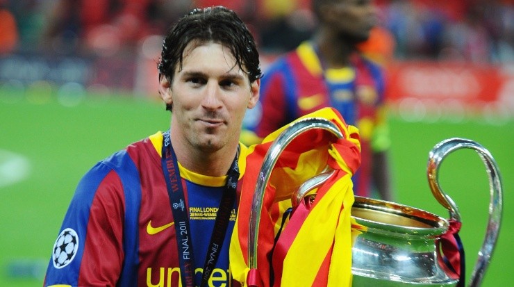 Messi with the UCL trophy in 2011. (Getty)