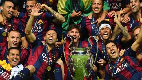 Barcelona players including Javier Mascherano, Lionel Messi, Neymar and Luis Suarez celebrate victory with the trophy after the UEFA Champions League Final between Juventus and FC Barcelona (Getty Images).