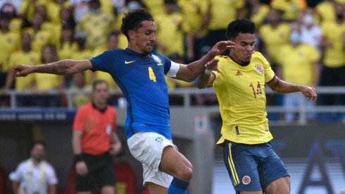 Marquinhos of Brazil against Luis Diaz of Colombia.
