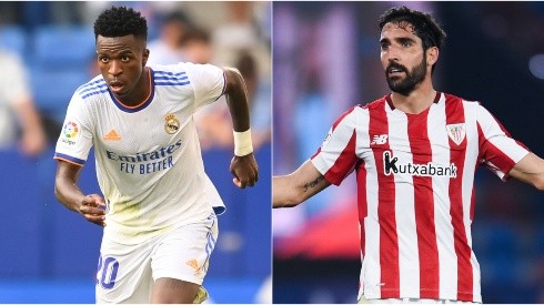 Vinicius of Real Madrid (right) and Raul Garcia of Athletic Club (right)