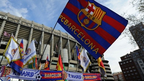 An FC Barcelona flag flies at a merchandise stall.