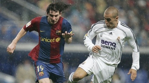 Lionel Messi of Barcelona (left) and Fabio Cannavaro of Real Madrid in action during a Clasico in 2006.