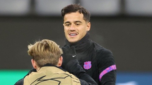 Coutinho en calentamiento con Barcelona.