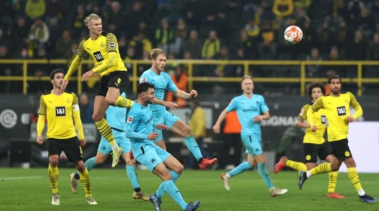 Erling Haaland of Borussia Dortmund scores (Photo by Dean Mouhtaropoulos/Getty Images)