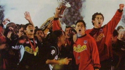 Neira celebrando el Campeonato en la quiebra de 2002.