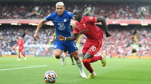 Sadio Mane of Liverpool battles for possession with Thiago Silva of Chelsea.