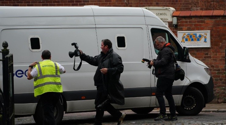 Photographers take photos of a prison van arriving at Chester Crown Court, where Manchester City footballer Benjamin Mendy is appearing charged with rape ( Photo by Peter Byrne/PA Images via Getty Images)