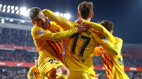 Barcelona players celebrate after scoring