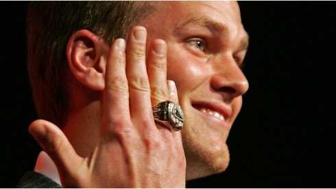 Quarterback Tom Brady showing his most recent Super Bowl ring.