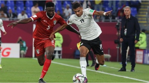 Faisal of Egypt battles for possession Ahmed Ibrahim of Sudan during The FIFA Arab Cup Qatar 2021