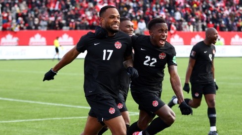 Cyle Larin #17 of Canada celebrates his goal with Richie Laryea #22