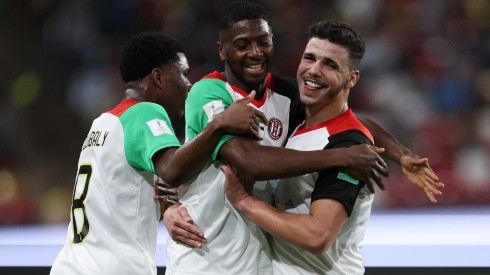 Al Jazira players celebrate after scoring