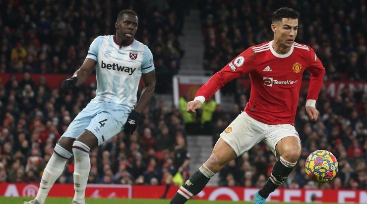 Cristiano Ronaldo of Manchester United in action with Kurt Zouma of West Ham (Photo by Matthew Peters/Manchester United via Getty Images)