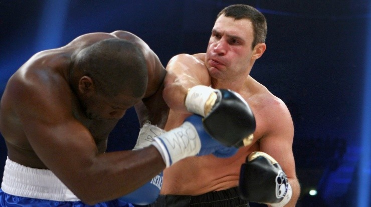 Vitali Klitschko smashing Kevin Johnson. (Alexander Hassenstein/Bongarts/Getty Images)