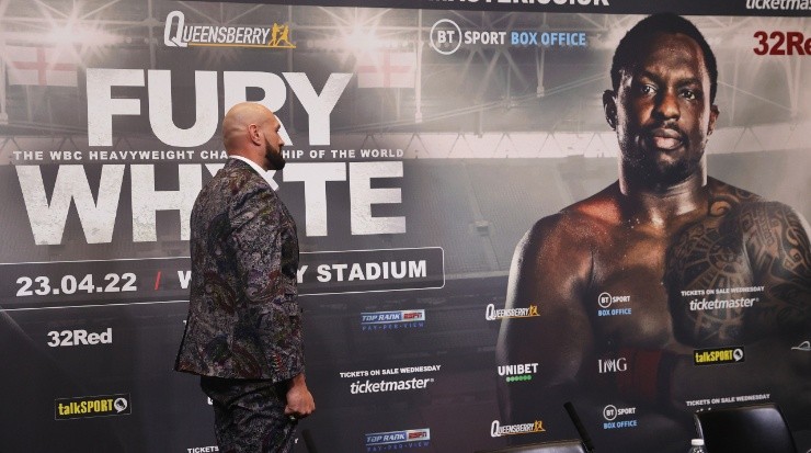 Tyson Fury stares at Whyte poster in the wall. (James Chance/Getty Images)
