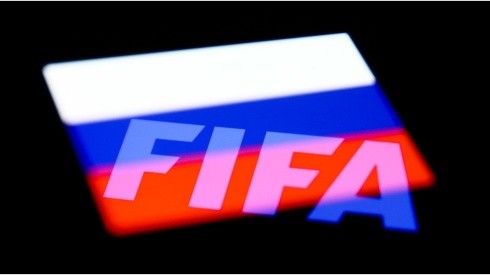 FIFA logo displayed on a phone screen and Russian flag displayed