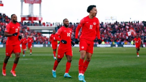 Taj Buchanan celebrates his goal as Canada beat Jamaica to qualify for Qatar 2022.