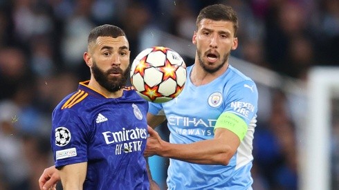 Karim Benzema of Real Madrid (left) and Ruben Dias of Manchester City.