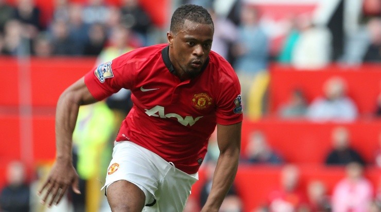 Patrice Evra during his time as a soccer player. (Matthew Peters/Manchester United via Getty Images)