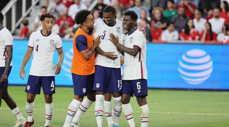 Weson McKennie #8 celebrates with Haji Wright #19 and Yunus Musah #6 of the United States after Wright sored a second half goal against Morocco at TQL Stadium on June 01, 2022 in Cincinnati, Ohio. (Photo by Andy Lyons/Getty Images)